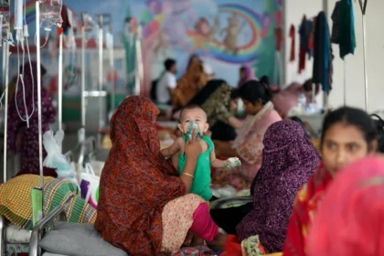 Doctors treating children during the Bangladesh measles outbreak amid global health concerns