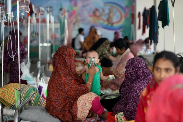 Doctors treating children during the Bangladesh measles outbreak amid global health concerns